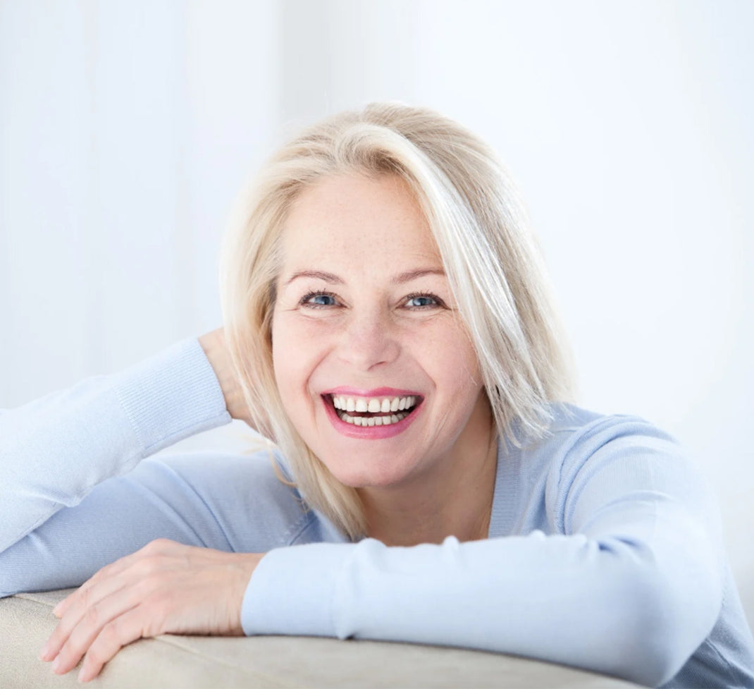 image of older lady with white hair and smiling