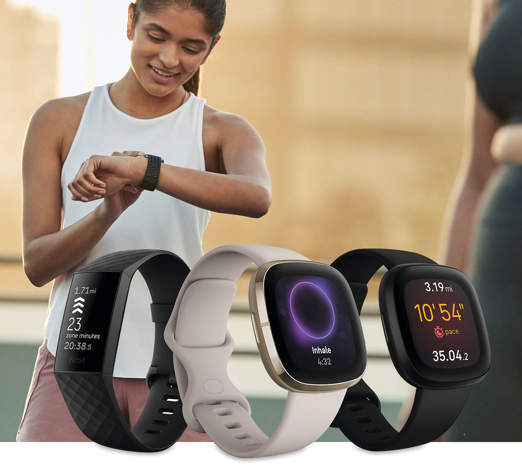 Fitbit range and woman wearing a Fitbit