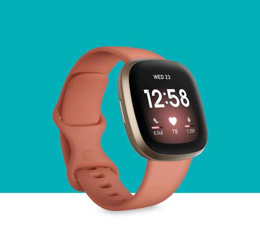 Fitbit Versa 3 on teal background