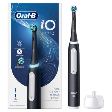 Oral-B iO Series 3 electric toothbrush in matte black with charging base and packaging