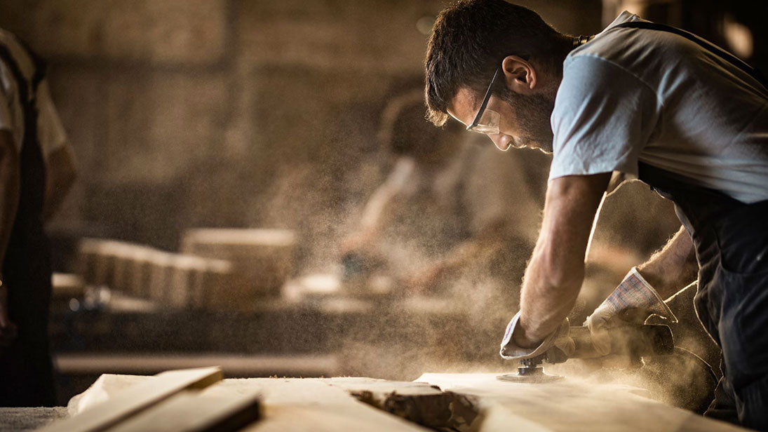 A male carpenter doing woodwork